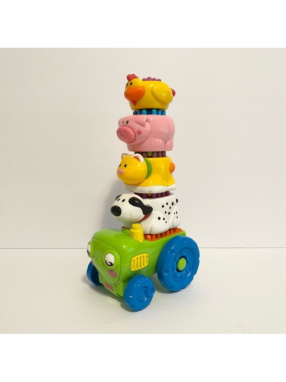 Fisher Price Brilliant Basics Shake + Stack Tractor Set Animals Bristle Blocks